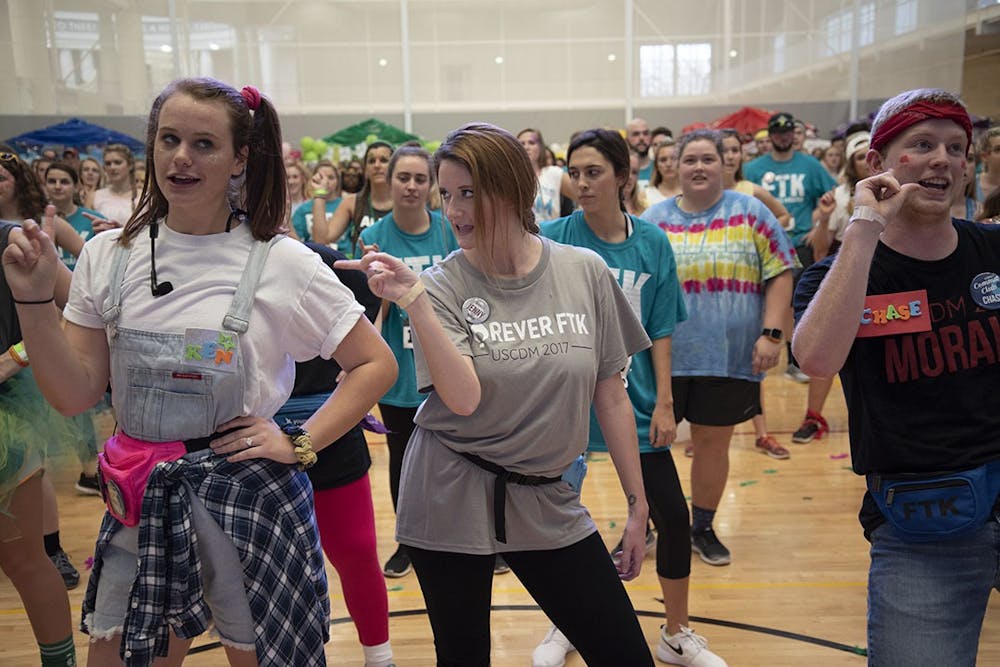 <p>Dance Marathon participants dance and point along to the lyrics of the song played.</p>