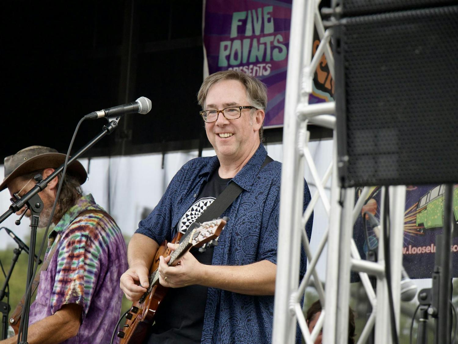 Greg Bates of Stillhouse looks into the crowd while playing his guitar on the stage at Five Points during JerryFest on Oct. 5, 2025. The festival lasted from 12 p.m. to 8 p.m.