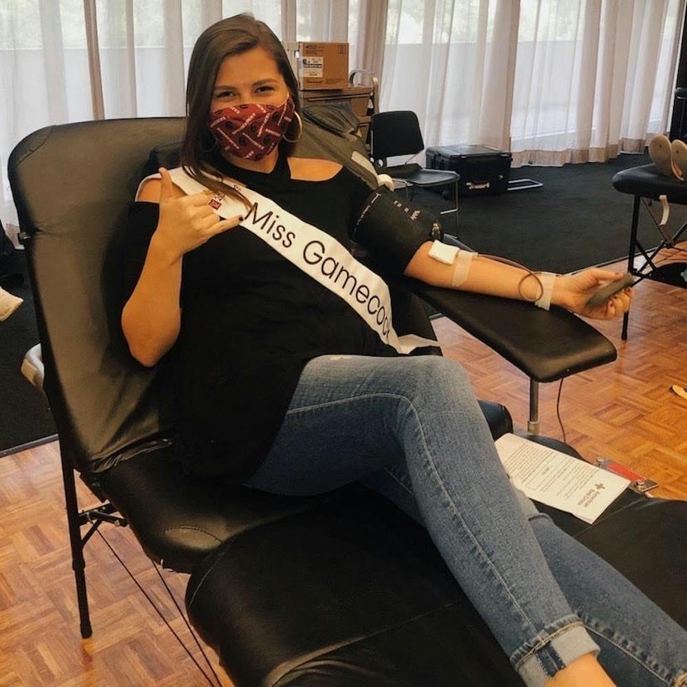 <p>Miss Gamecock and third-year mass communications student Callie Farrell donates blood.&nbsp;</p>