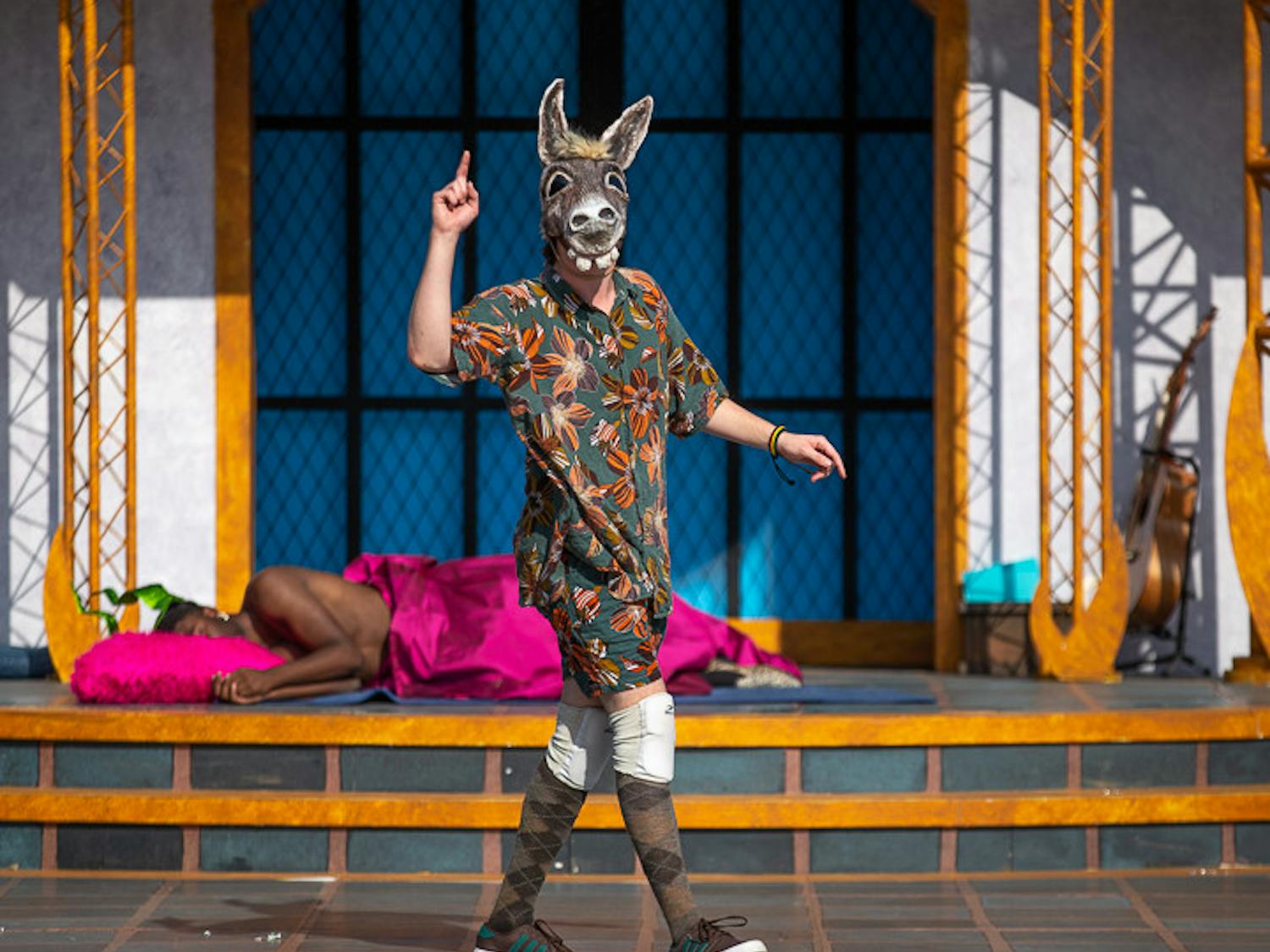 Bottom, portrayed by third-year theatre and English student Michael Williams walks across the stage after his character's head is "transformed" into a donkey in "A Midsummer Night's Dream" on Oct. 9, 2022. USC Department of Theatre and Dance held the play from October 2 to 9, 2022. 