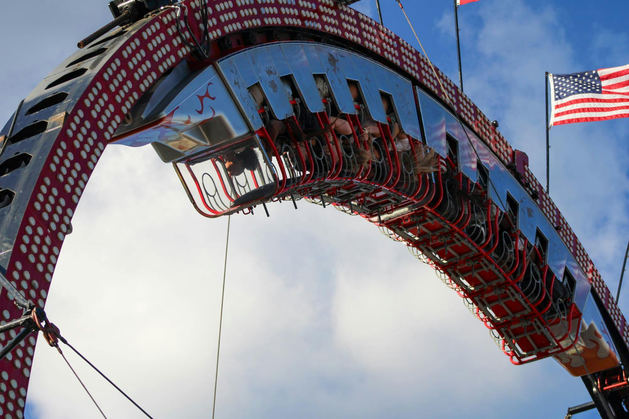 South Carolina State Fair attendees ride the "Ring of Fire" on Oct. 13, 2025. The ride, one of over five dozen at the fair, reaches a height of 60 feet.