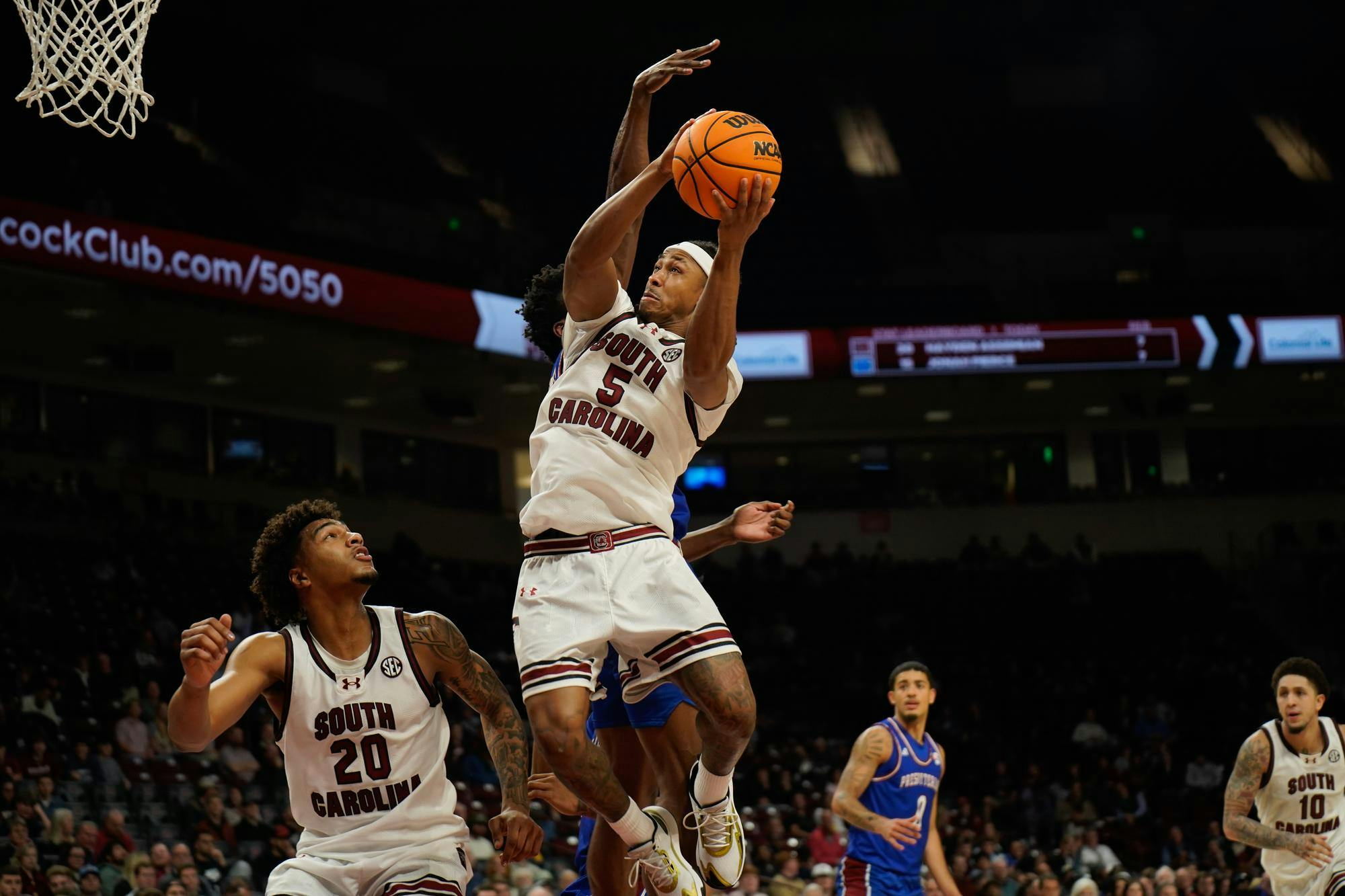 FILE — Redshirt senior guard Meechie Johnson goes up for a layup against a Presbyterian College defender in the Gamecocks' matchup against Presbyterian College at Colonial Life Arena on Nov. 12, 2025. Johnson played a team-high of 25 minutes in this game.