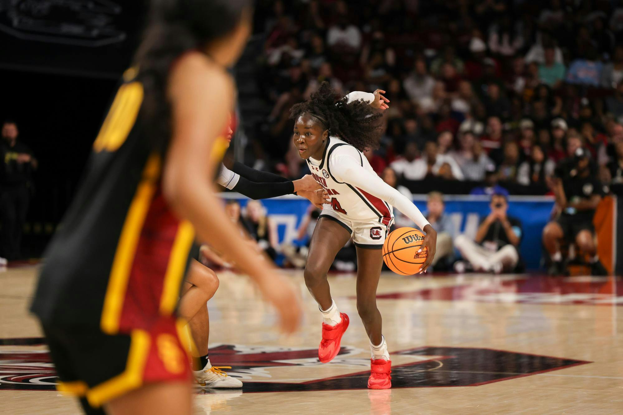 Freshman guard Agot Makeer regains control of the ball during the March Madness game against USC on March 23, 2026. Makeer had a season-high four steals during the game.