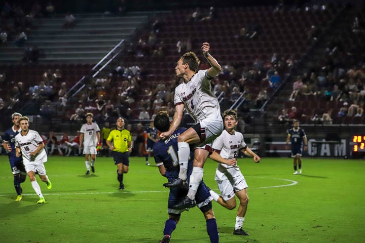 Redshirt senior defensive midfielder Will Crain attempts to block the ball during South Carolina's matchup against Queens on Sept. 20, 2022. The Gamecocks beat the Royals 3-1.