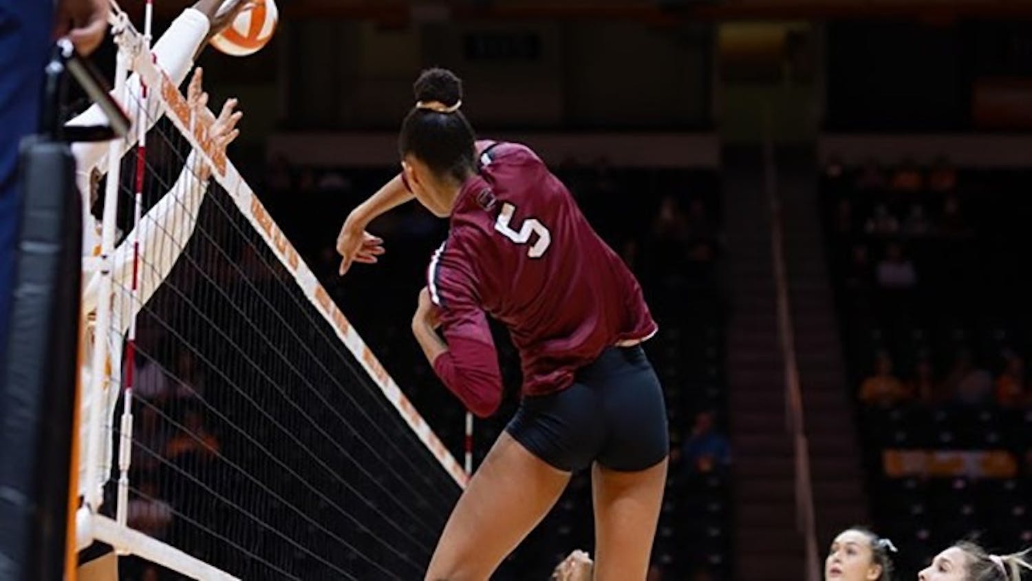 Graduate student outside hitter/left side Kyla Manning jumps from left side to swing at the ball. Within her one season at USC, Manning has 273 kills and six blocks. 