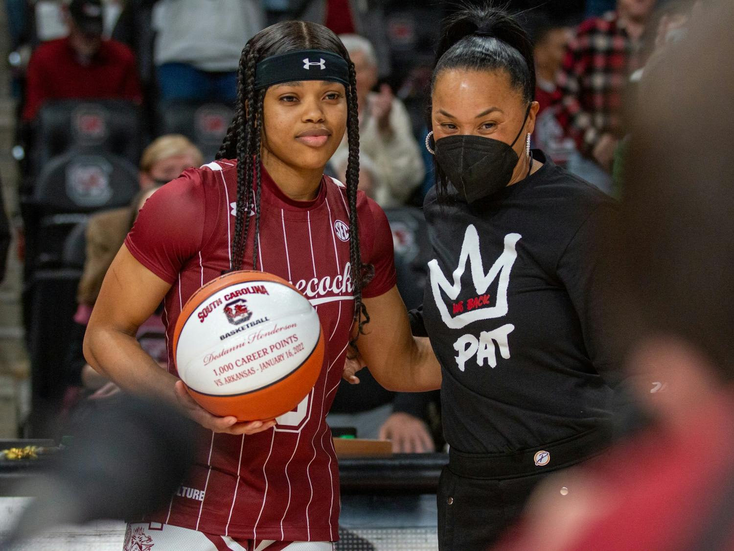 Senior Guard Destanni Henderson poses with Coach Dawn Staley with her 1,000 career points basketball on January 24, 2022 at Colonial Life Arena. Henderson achieved 1,000 career points on January 16th, 2022 against Arkansas. 