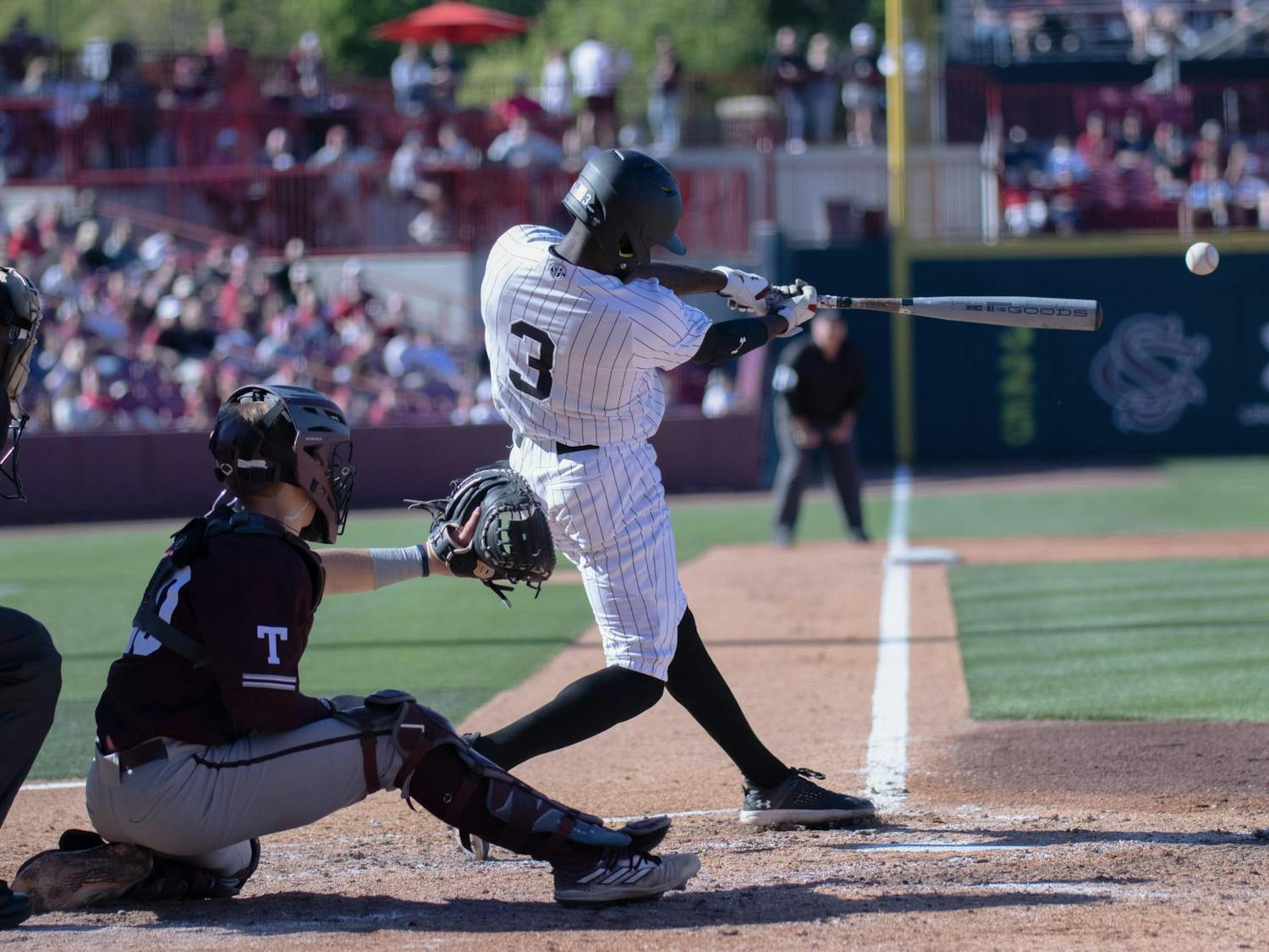 Freshman infielder Lee Ellis swings and hits the ball during South Carolina’s game against Texas A&amp;M on April 6, 2024. The Gamecocks lost 6-3 to the Aggies in the matchup.