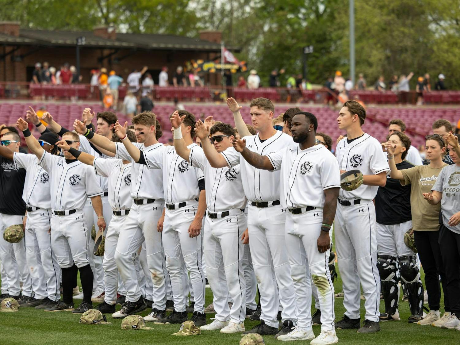 The University of South Carolina baseball team gathers during the playing of the alma mater after its loss to No. 1 Tennessee on March 30, 2025, at Founders Park. The Gamecocks lost their third game of the series 7-2, completing a sweep for the Volunteers.