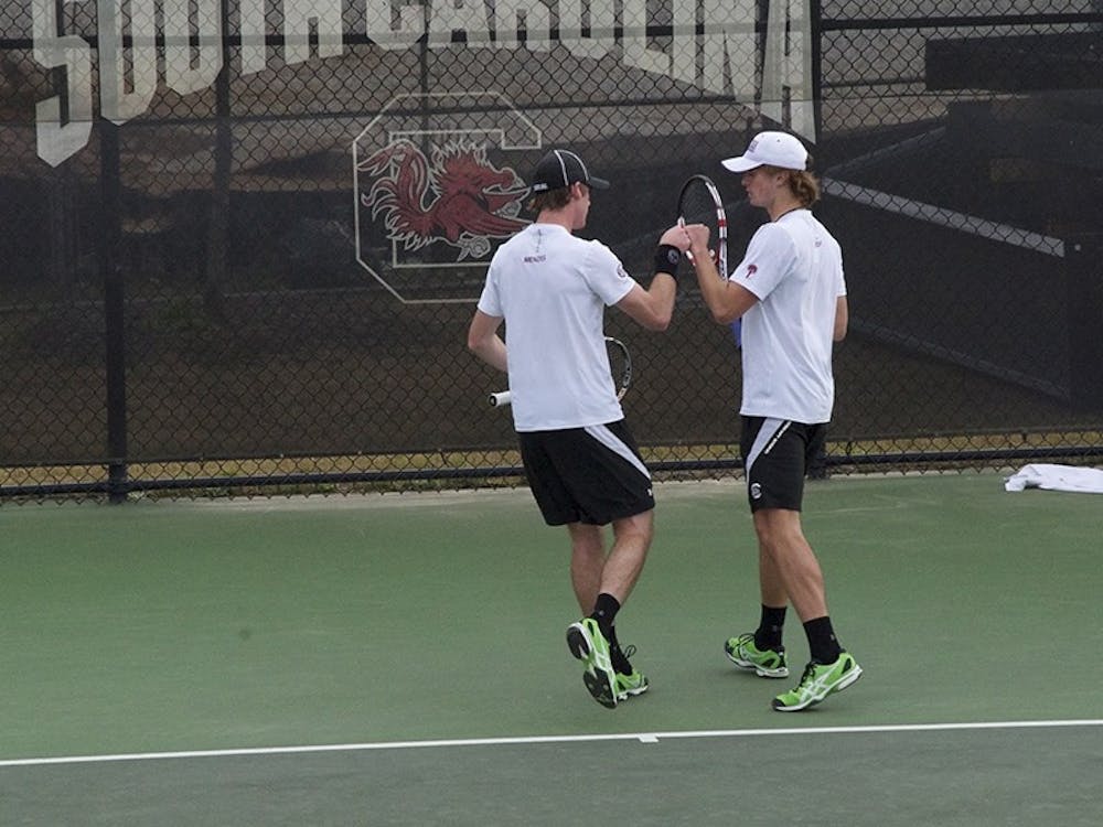 Sophomore Kyle Koch (right) and doubles partner Harry Menzies won their matches against Georgia and Tennessee. 