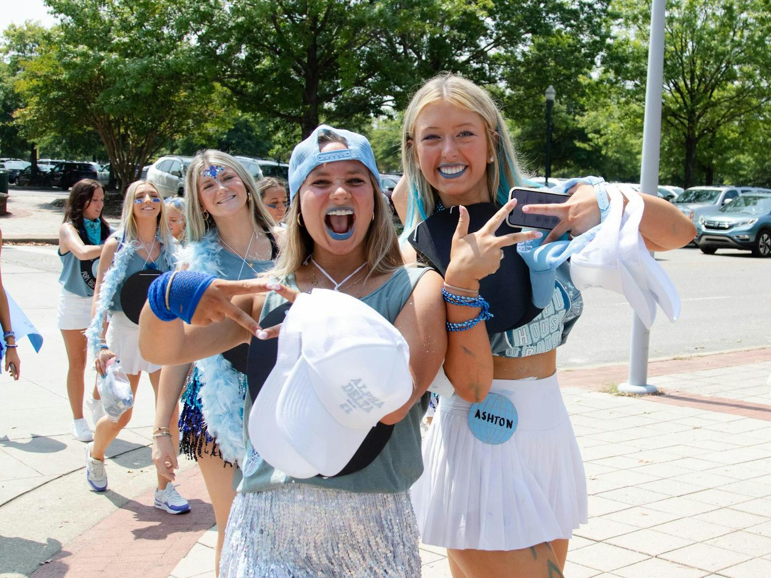 Alpha Delta Pi sisters walk to Colonial Life Arena to meet their new members on Aug. 27, 2023. On Bid Day, students receive an invitation to a sorority on campus.