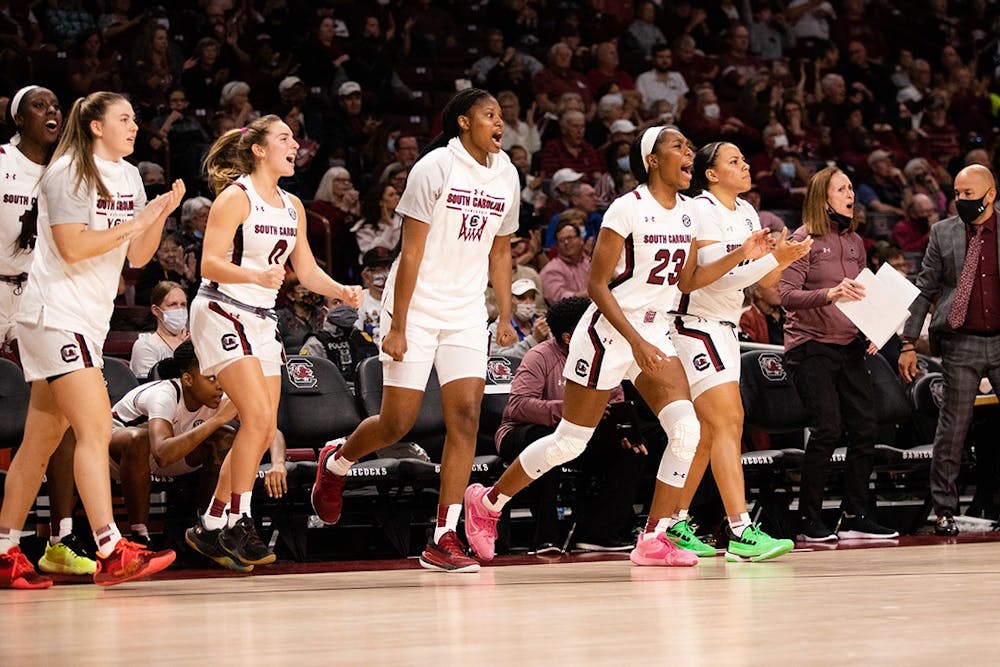 <p>Members of the Women's basketball team jump out of their seats and cheer their teammates on during their match against Clemson on Nov. 17. The top-ranked team will compete in the 12-game, 3-day Battle 4 Atlantis tournament with their first round beginning on Saturday.&nbsp;</p>