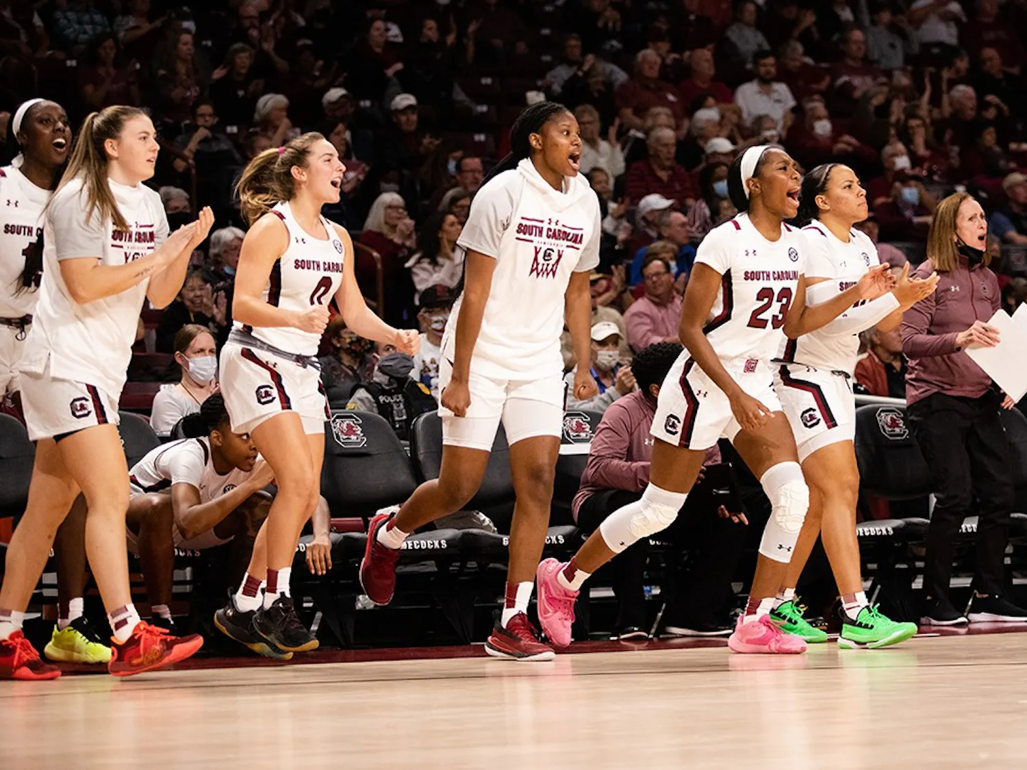 Members of the Women's basketball team jump out of their seats and cheer their teammates on during their match against Clemson on Nov. 17. The top-ranked team will compete in the 12-game, 3-day Battle 4 Atlantis tournament with their first round beginning on Saturday. 