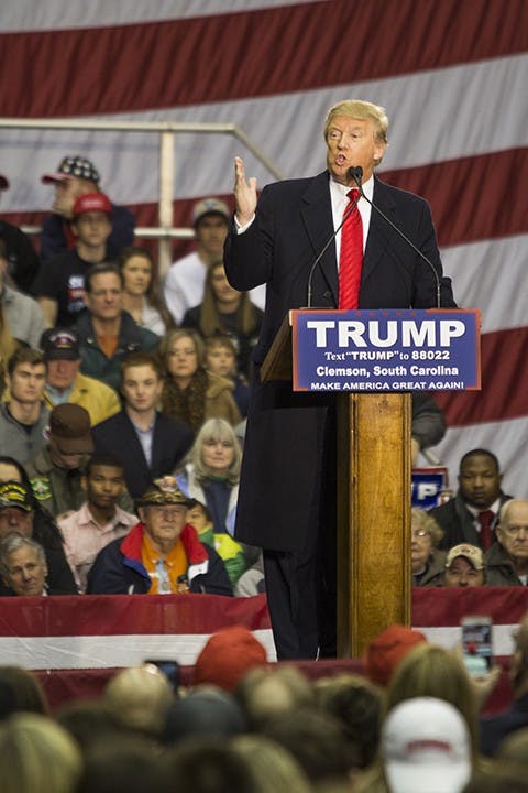Presidential hopeful Donald J. Trump addresses economic concerns and answers audience questions at the T. Ed Garrison Arena in Clemson, South Carolina.
