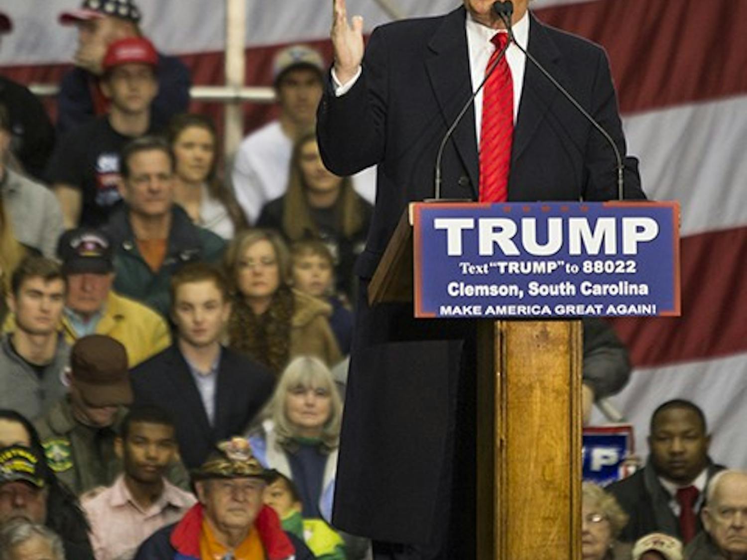 Presidential hopeful Donald J. Trump addresses economic concerns and answers audience questions at the T. Ed Garrison Arena in Clemson, South Carolina.
