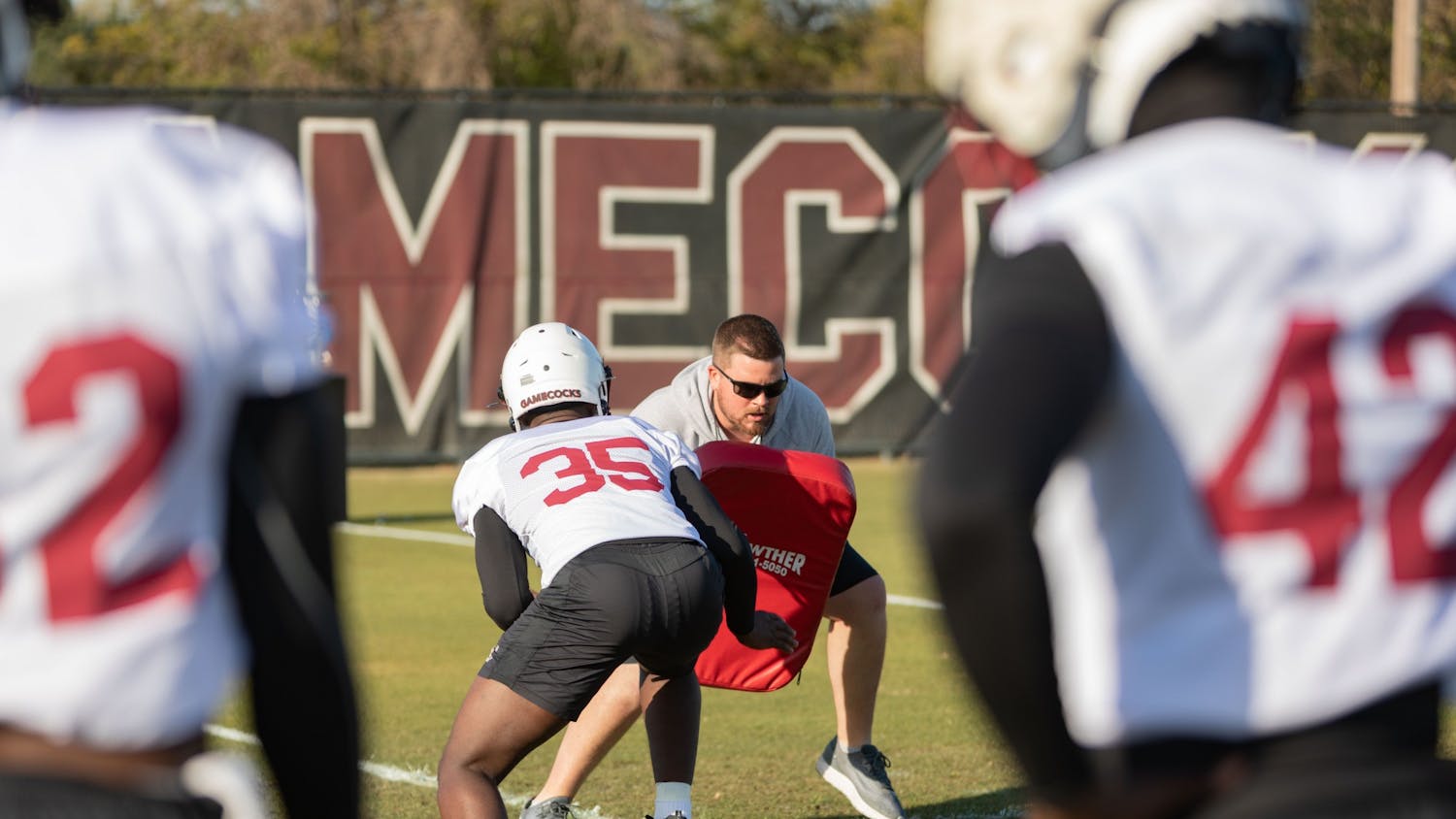 FILE— The SC football team goes over defensive drills during a spring practice on Tuesday, March 15, 2022. &nbsp;