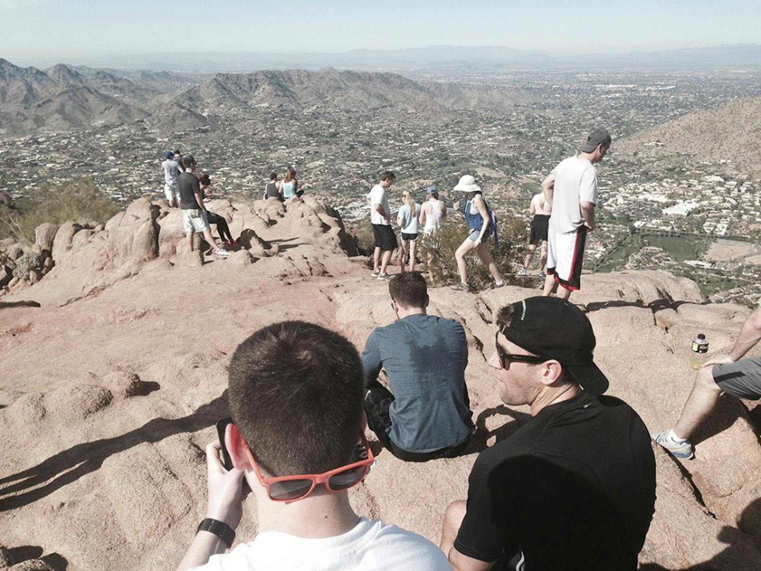 You can almost always count on having company on top of Camelback Mountain near the border of Phoenix and Scottsdale, Ariz. (Craig Hill/Tacoma News Tribune/TNS)