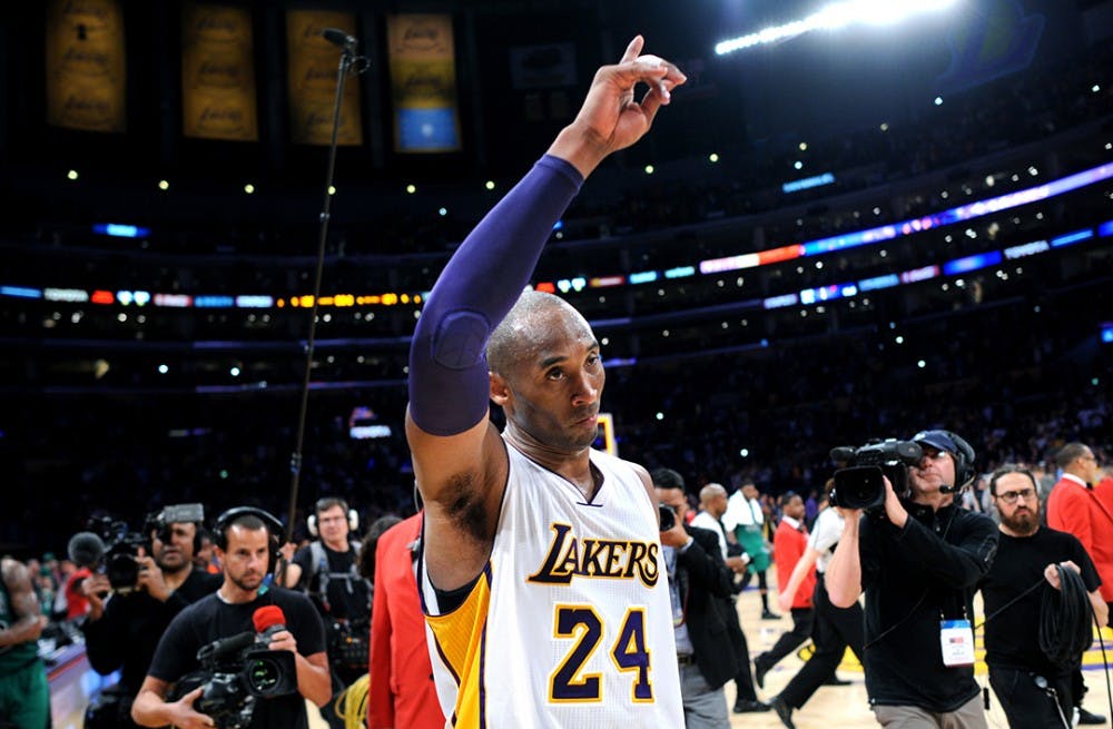 The Los Angeles Lakers&apos; Kobe Bryant waves to the crowd as he leaves the court following a 107-100 loss against the Boston Celtics at Staples Center in Los Angeles on Sunday, April 3, 2016. (Wally Skalij/Los Angeles Times/TNS)