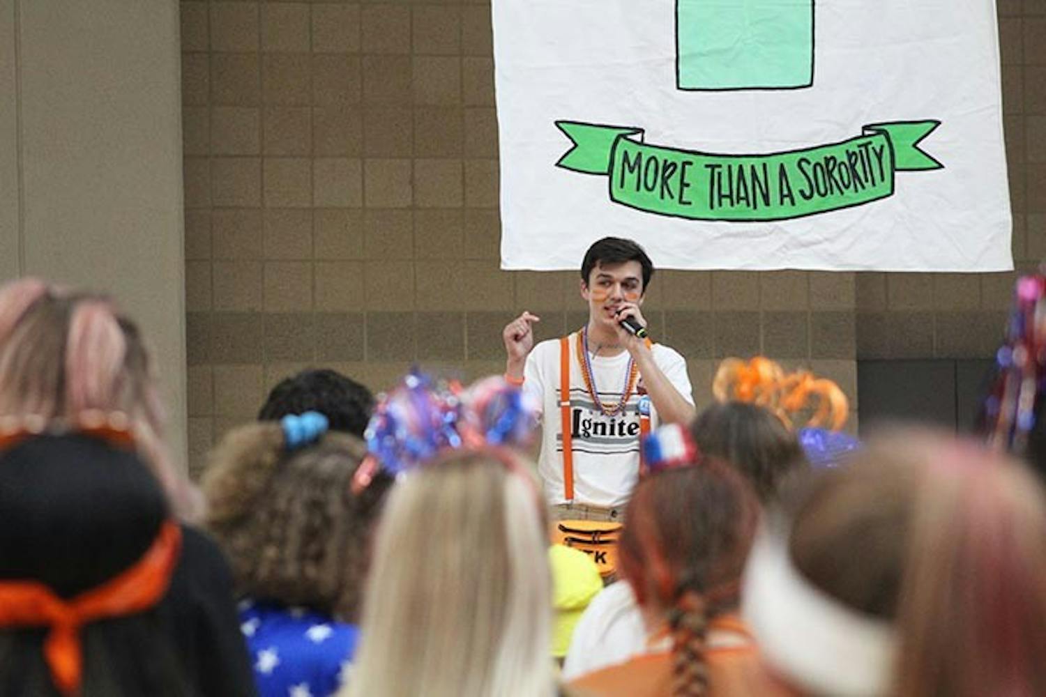 First-year economics student Seth Hajzus shares his experience with crowd at Dance Marathon and speaks about the families that he has met through working with the organization.&nbsp;