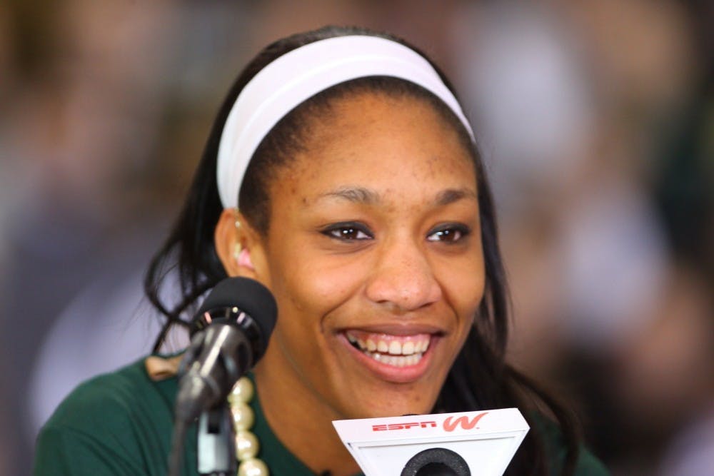 Top national prospect A'ja Wilson concluded a year of heavy recruiting with a few simple words. "I will be attending the University of South Carolina," she said on Wednesday, April 16, 2014. Wilson pledged to USC at Heathwood Hall Episcopal School, surrounded by family and friends who loudly applauded as she once again flashed her familiar smile. Telling the decision to ESPNU simultaneously, Wilson didn't pause for any dramatics, knowing that the past year where she kept her thinking to herself had been dramatic enough. (Tracy Glantz/The State/MCT)