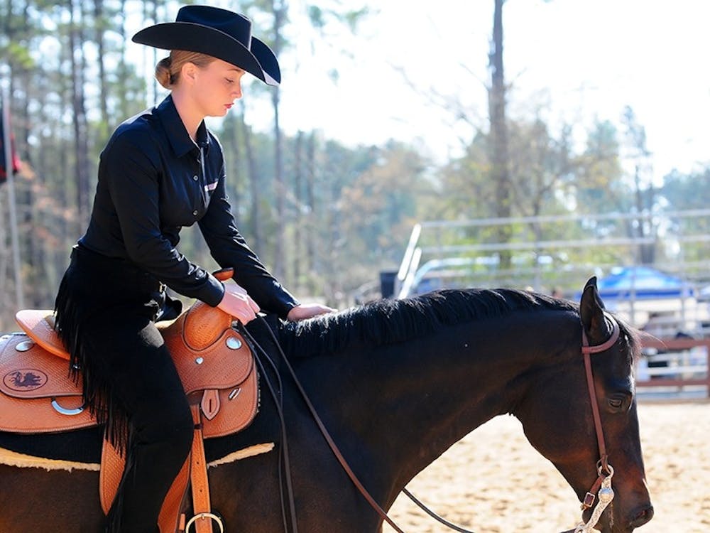 Coach Boo Major says that redshirt junior Johnna Letchworth has helped improve the horsemanship team by motivating the players to work harder and do more in practice.
