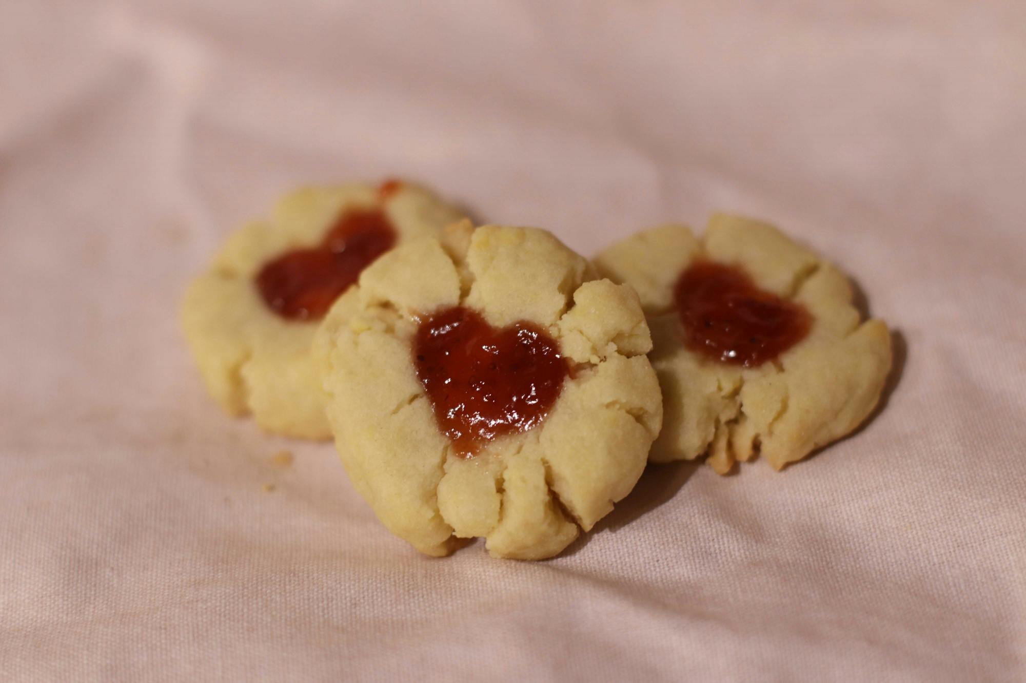 Raspberry jam cookies made by Amelia Farrell on Feb. 8, 2022. The cookies bring a unique twist to the classic, buttery shortbread cookie by adding raspberry jam to form the heart center, making it a perfect snack for Valentine's Day.