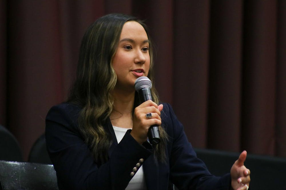 <p>FILE - Then presidential candidate and third-year political science student Emily “Emmie” Thompson answers a question at the Student Government debate on Feb. 15, 2023. Thompson is now the student body president.</p>