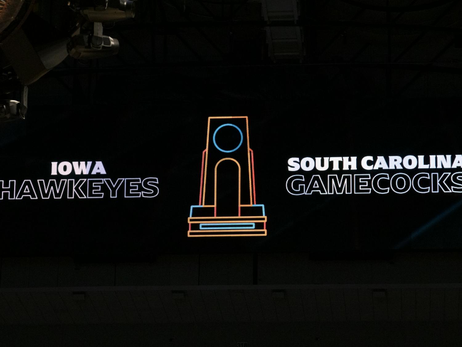 The American Airlines Center jumbotron displays the matchup between the University of South Carolina Gamecocks and the University of Iowa Hawkeyes on March 31, 2023. The matchup brought a record number of viewers, with 5.5 million people tuning in to ESPN on average and 6.6 million views at its peak.