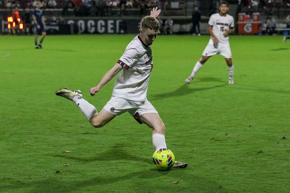 <p>Redshirt junior midfielder Jack Burgess kicks the ball during South Carolina's game against Georgia Southern on Nov. 5, 2024 at Stone Stadium.</p>