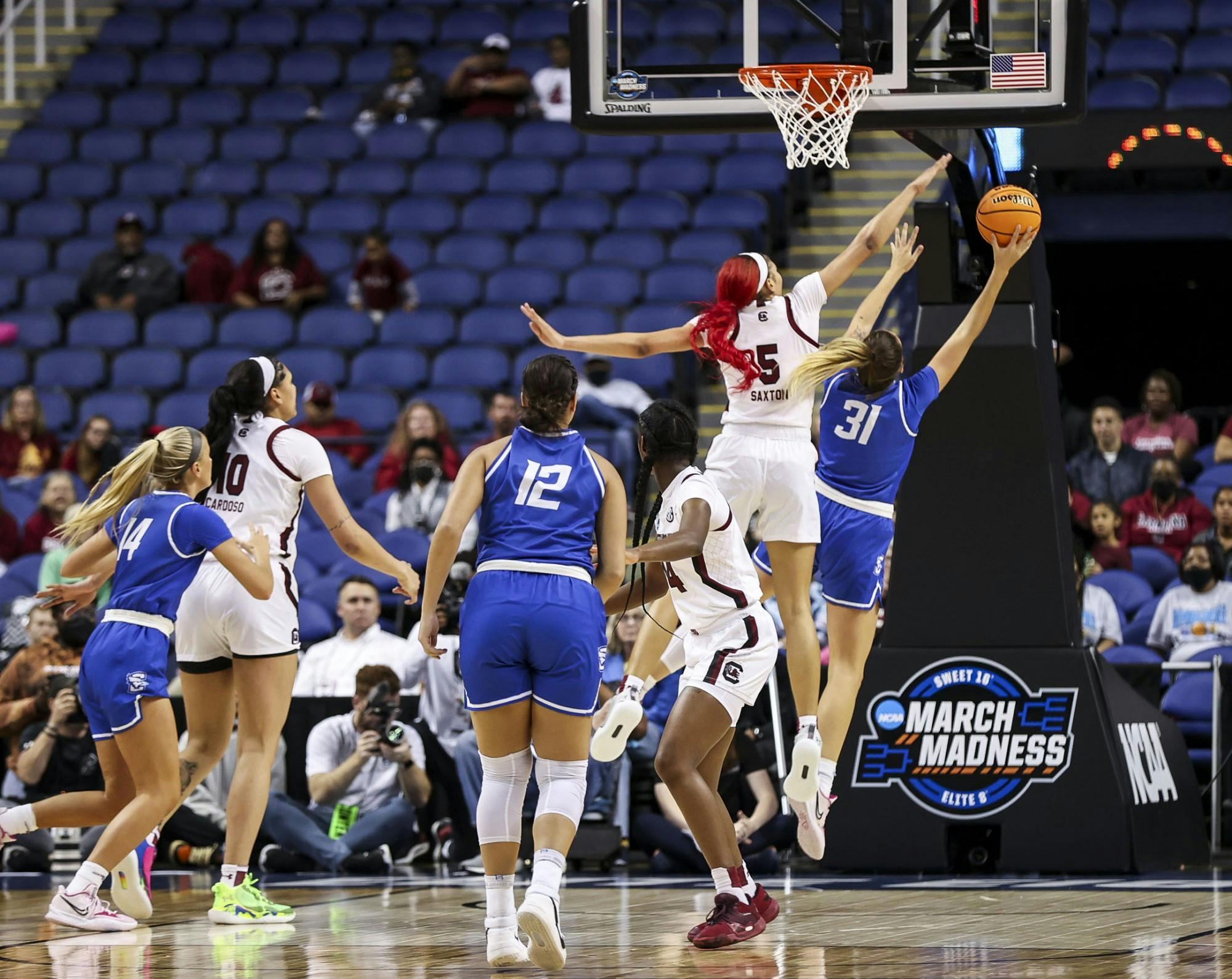 Senior forward Victaria Saxton blocking a shot during the third quarter of South Carolina's 80-50 victory over Creighton in the Elite Eight on Sunday, March 27, 2022.