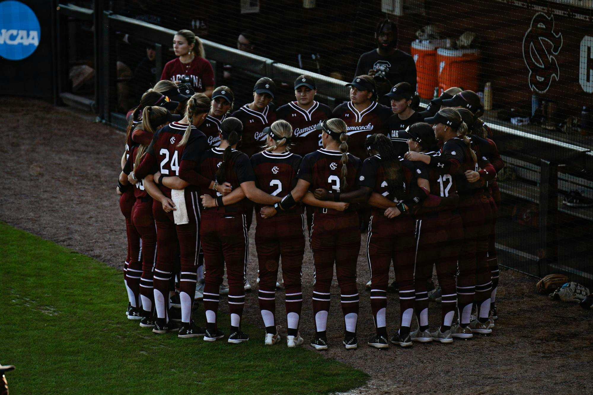 The USC softball team starts the game off with a pregame prayer as they head into their matchup against Furman at Beckham Field on Oct. 17, 2025. This is the team's fourth exhibition game so far.