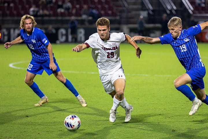 Freshman midfielder Micah Colodny runs the ball down the field during the matchup with Kentucky on Nov. 1, 2022. The Wildcats beat the Gamecocks 3-0.