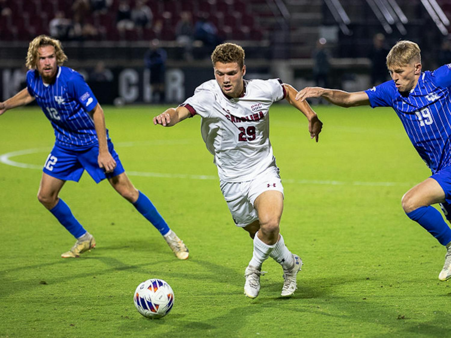 Freshman midfielder Micah Colodny runs the ball down the field during the matchup with Kentucky on Nov. 1, 2022. The Wildcats beat the Gamecocks 3-0.