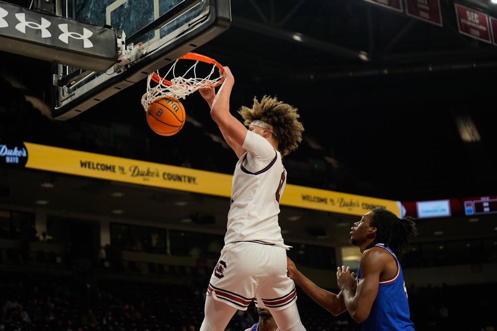 <p>Junior forward Jordan Butler dunks the ball in the Gamecocks' matchup against Presbyterian College at Colonial Life Arena on Nov. 12, 2025. The Gamecocks won this game 81-61.</p>