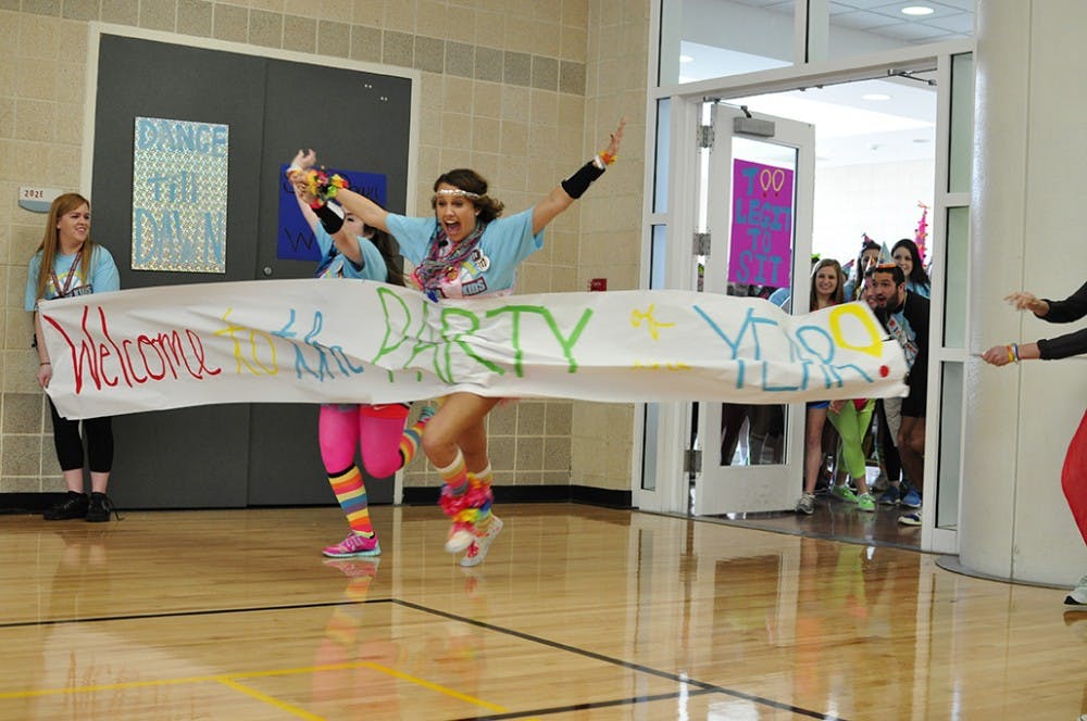 	The morale team started off the marathon with a run-in through a banner that read &#8220;Welcome to the Party of the Year.&#8221;
Brian Almond/The Daily Gamecock
