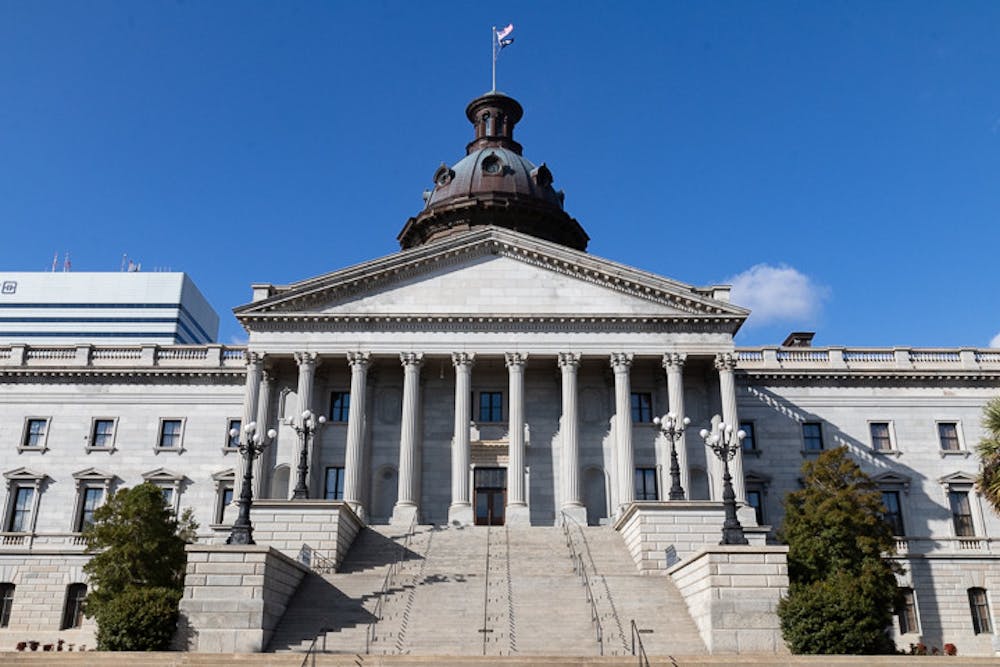 <p>FILE—The south entrance of the South Carolina Statehouse on Jan. 17, 2022. The College and University Trustee commission convened on Jan. 10, 2023 after deciding who would move forward in the screening process to be eligible for the final stage of voting.</p>