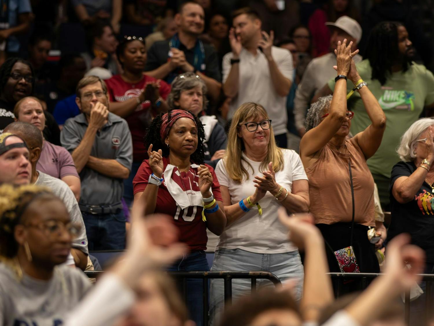University of South Carolina fans clap during a timeout at Amalie Arena on April 4, 2025. The Gamecocks played in front of a large crowd of fans who traveled to Tampa, Florida, for the Final Four.