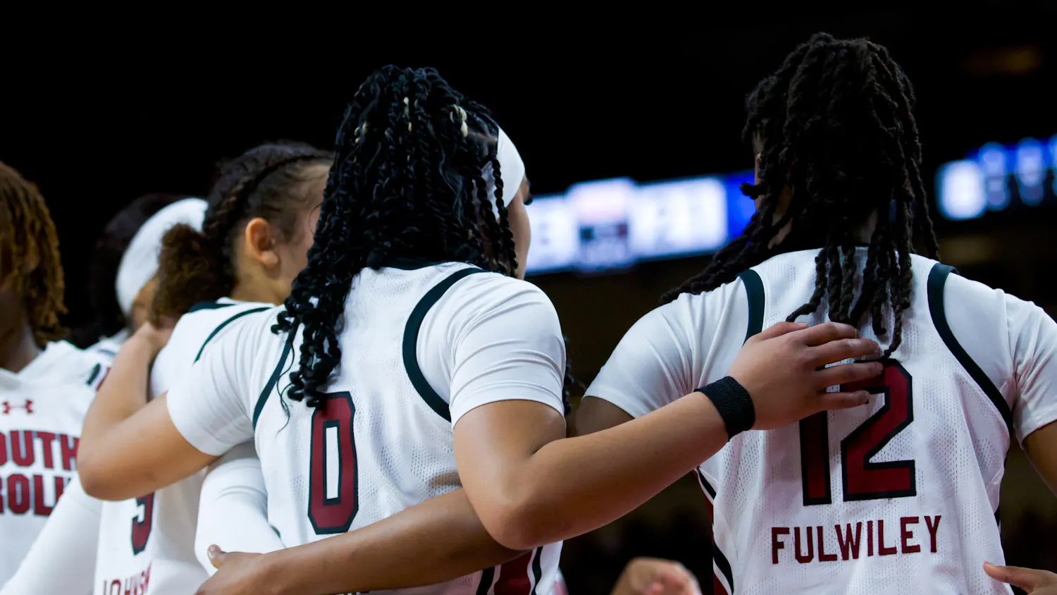 Freshman guard Tessa Johnson, senior guard Te-Hina Paopao and freshman guard MiLaysia Fulwiley huddle together during a timeout against the Wildcats. Combined, the three players attributed 39 points to South Carolina’s score of 98-36 against Kentucky on Jan. 15, 2023. 