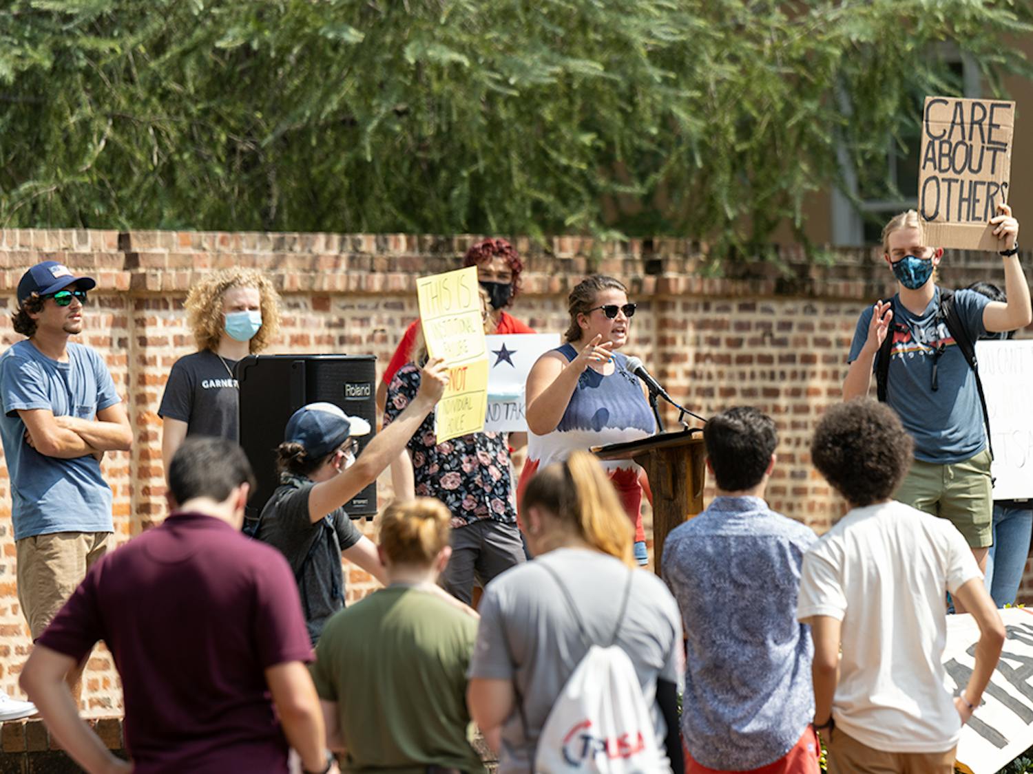 Members of the USC Turning Point USA chapter on Greene Street give speeches on their stance on the mask mandate. The Carolina Socialists counterprotested the speakers with their own opinions.&nbsp;