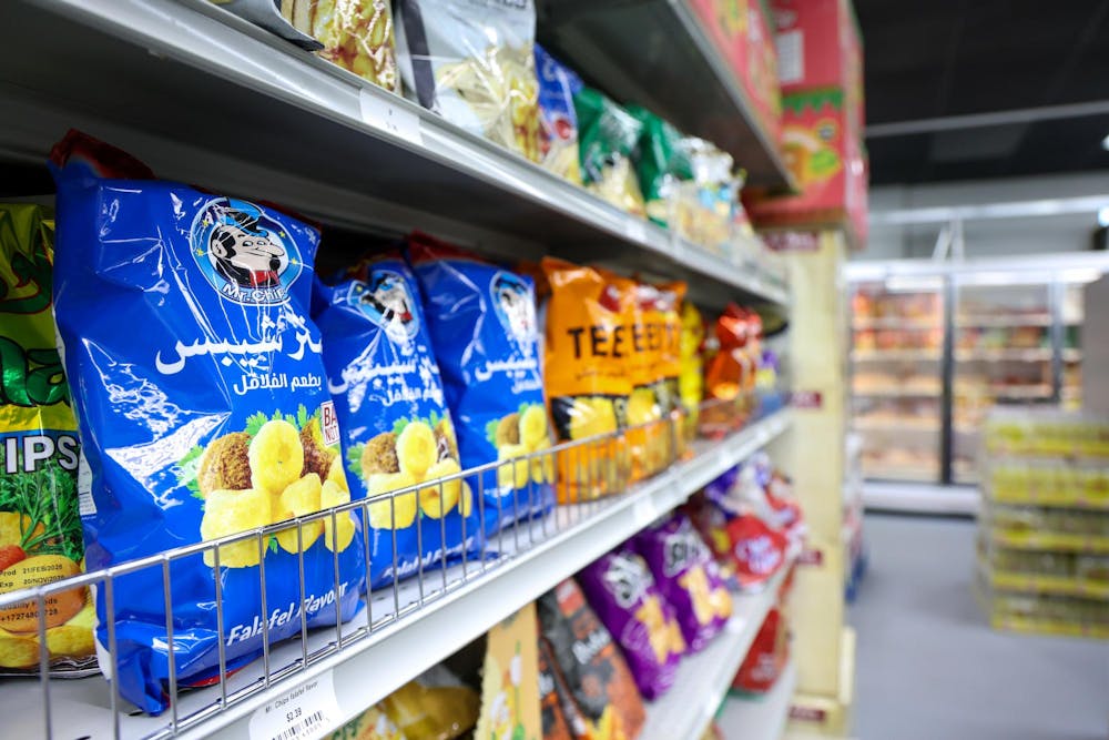 <p>Multiple Middle Eastern snacks on display at Al Salam Groceries on Aug. 18, 2026. The store is open every day from 8 a.m. to 10 p.m.</p>
