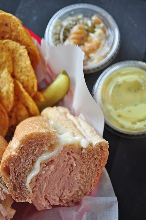 Everybody loves a pickle with their sandwich. The TSHM with stone-ground tortilla chips and house made honey mustard dip.