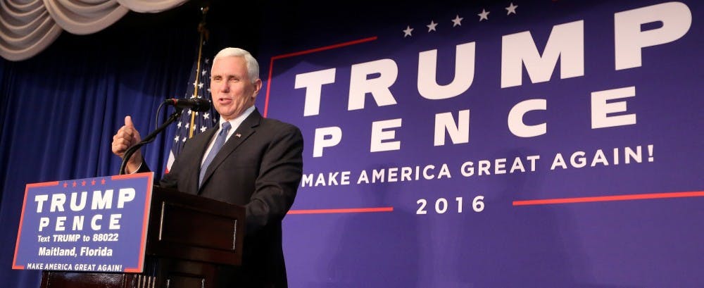 Republican vice presidential candidate Mike Pence takes the stage at a rally on Monday, Oct. 31, 2016 in Maitland, Fla. (Joe Burbank/Orlando Sentinel/TNS) 