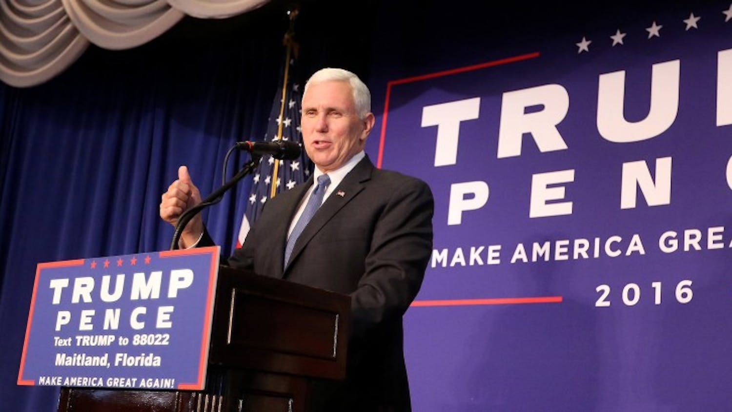 Republican vice presidential candidate Mike Pence takes the stage at a rally on Monday, Oct. 31, 2016 in Maitland, Fla. (Joe Burbank/Orlando Sentinel/TNS)