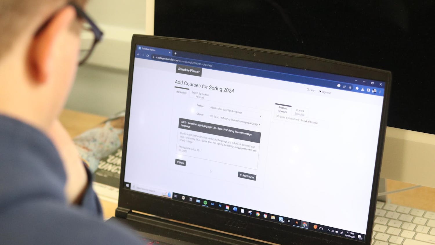 A photo illustration of someone researching an ASL course on Nov. 20, 2023. ASL courses will soon be available to students of all years and count toward their Carolina Core foreign language requirement.