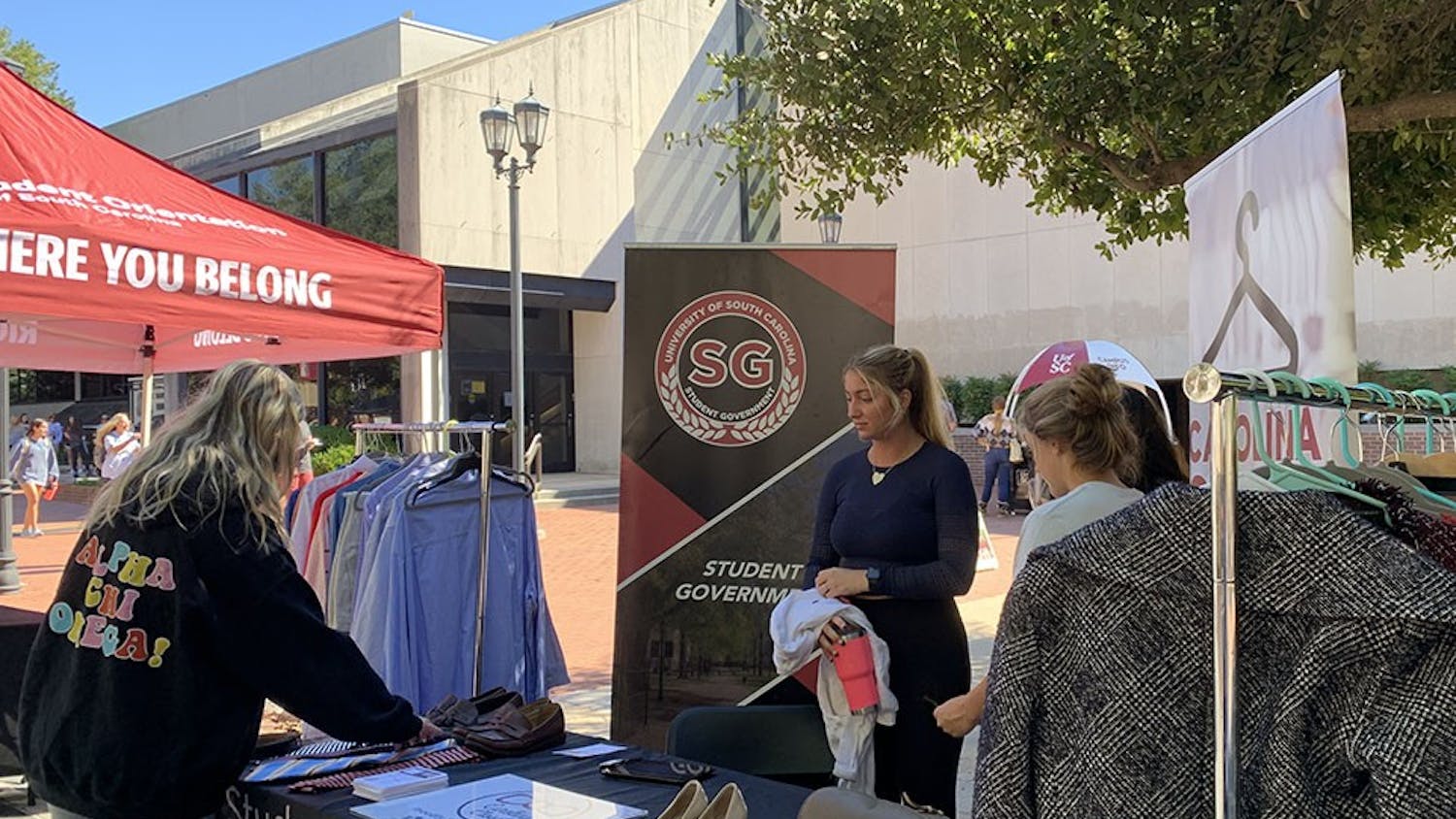 A student looks at ties at the pop-up Carolina Closet on Greene Street. The pop-up was a part of Student Government's Key Week.