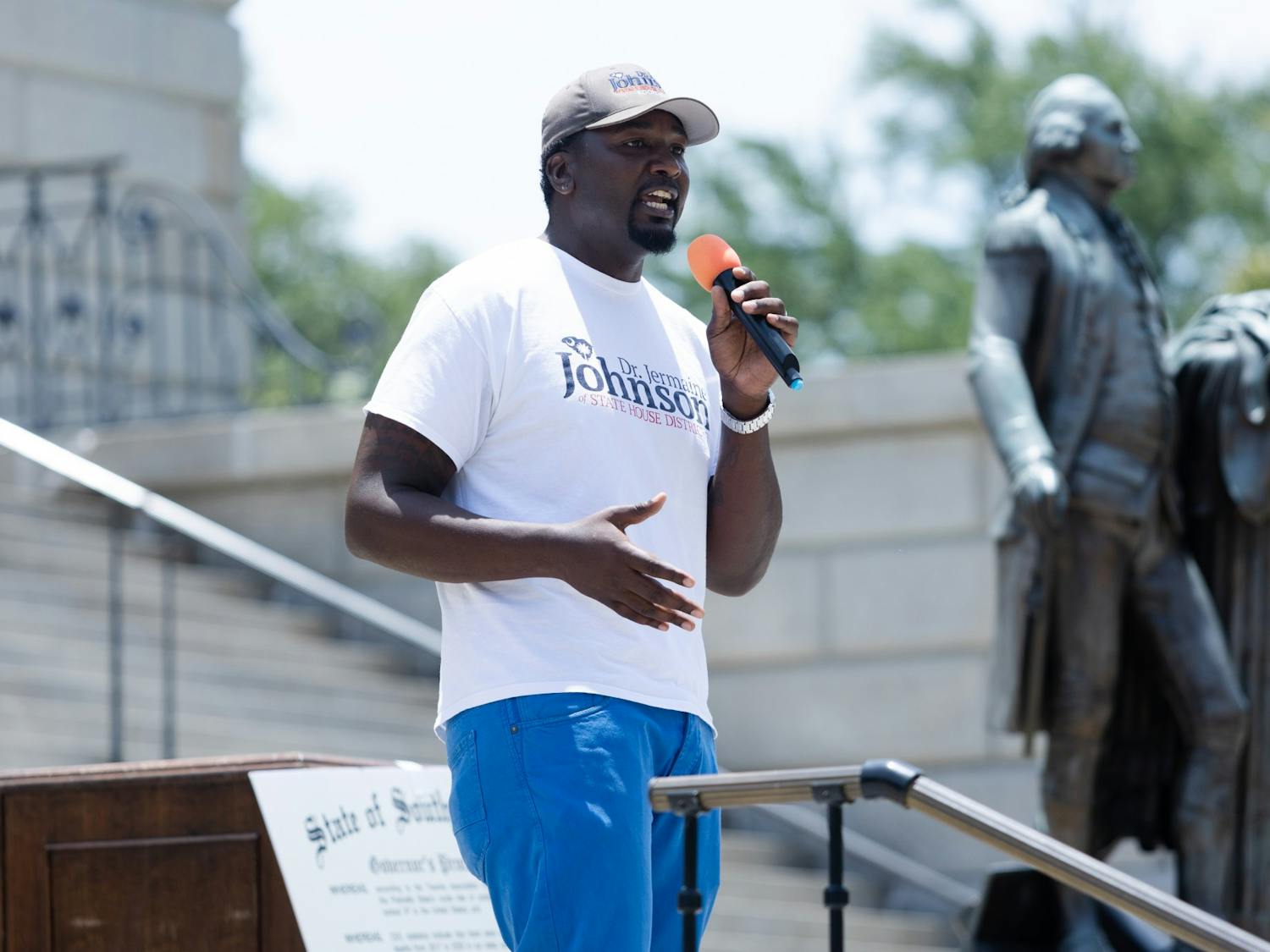 Rep. Jermaine Johnson (D-Richland) speaks to the crowd during the "Wear Orange" rally on June 4, 2022. Speakers at the rally called for lawmakers to combat gun violence.&nbsp;