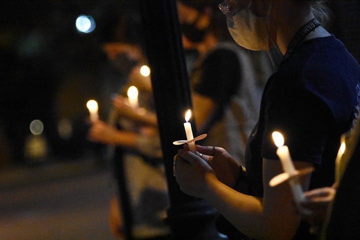Students gather on Greene Street for a memorial to honor Supreme Court Justice Ruth Bader Ginsburg. Ginsburg had been a Supreme Court Justice since 1993.