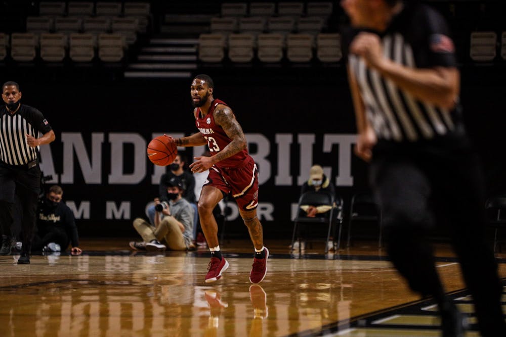 Redshirt senior Seventh Woods dribbles the ball down the court during South Carolina's game at Vanderbilt. South Carolina lost 93-81.