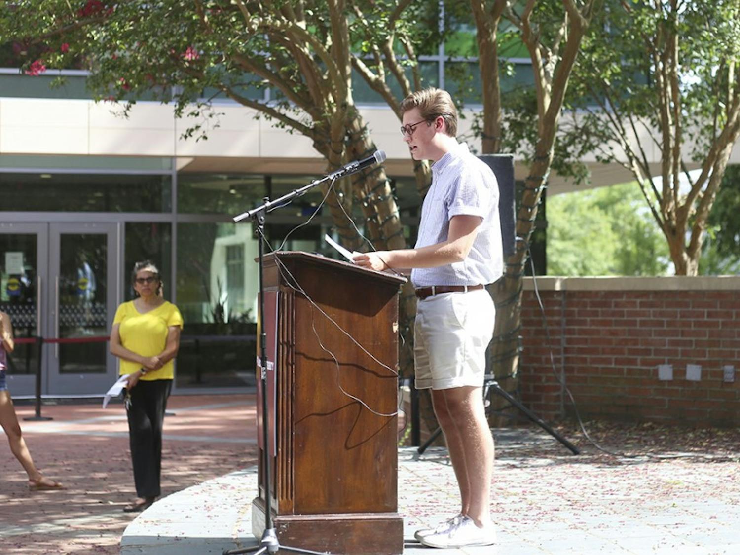 Second-year political science major Zechariah Willoughby reads the Carolinian Creed during the rally held on the Russell House patio, Wednesday afternoon.&nbsp;