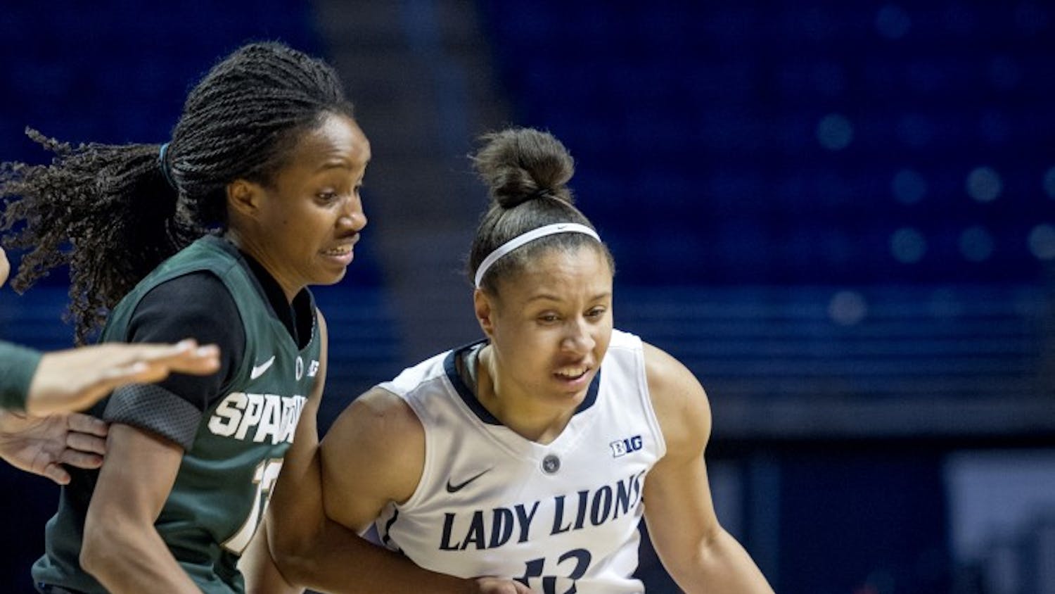 Michigan State's Morgan Green, left, keeps tabs on Penn State's Lindsey Spann on Thursday, Jan. 7, 2016, at the Bryce Jordan Center in University Park, Pa. Michigan State won, 71-55. (Abby Drey/Centre Daily Times/TNS)