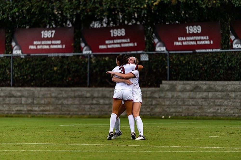 Members of the women's soccer team celebrate after a goal in an earlier 2020 season game against Missouri. The Gamecocks beat the Tigers Tuesday night to advance to the SEC Tournament semifinals.